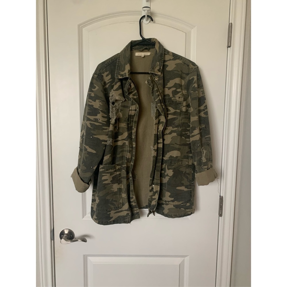 Camo denim jacket with studded sleeves